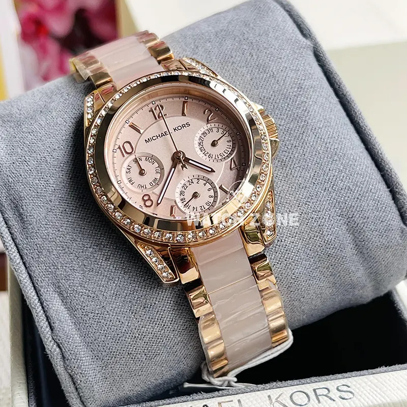 Michael kors mini blair rose gold best sale